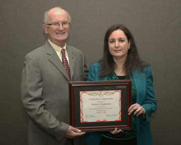 Board President Dr. Jack Bedell with Sherry O'Donnell, RN, BS, CCM, Monarch 